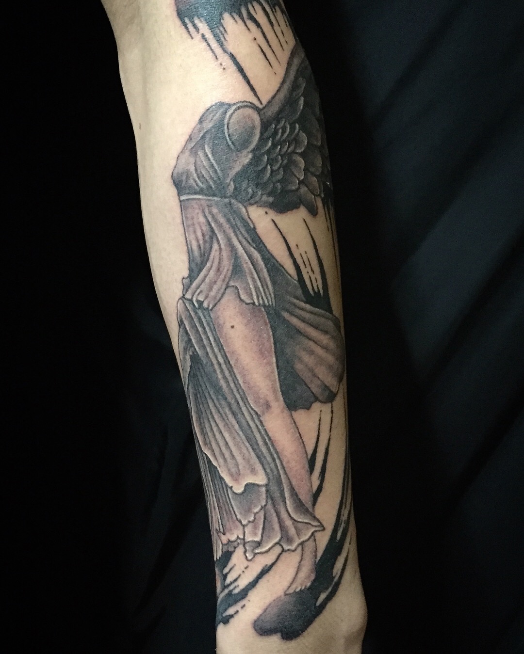 Realistic Winged Victory of Samothrace inspired tattoo