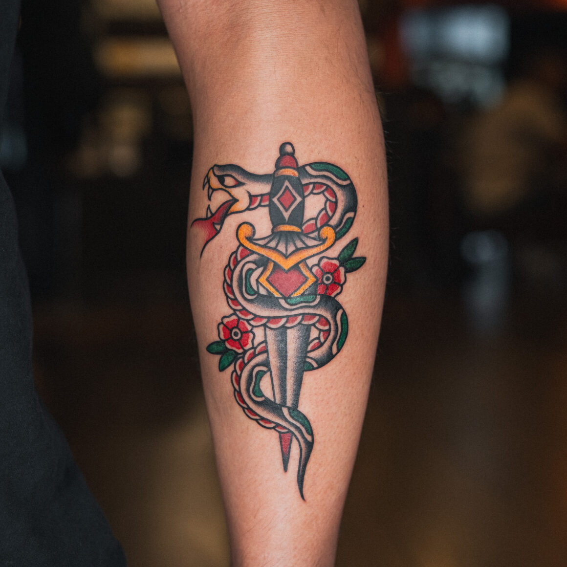 American Traditional Snake and Dagger Tattoo - GOOD TIMES INK