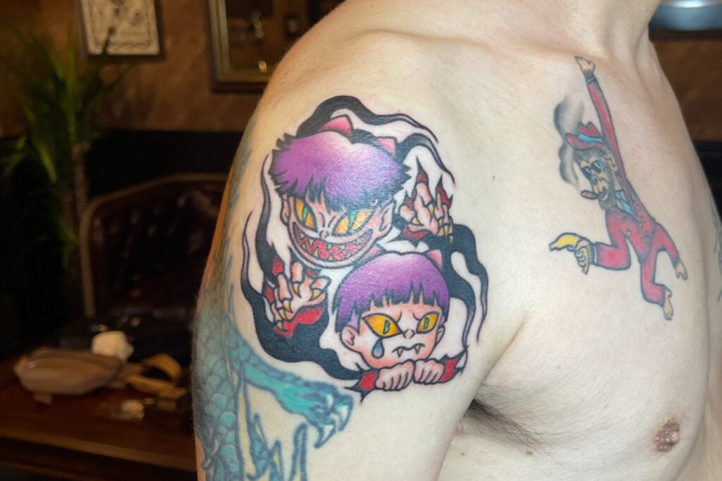 Neko Musume tattoo rendered in American Traditional style, Osaka.
