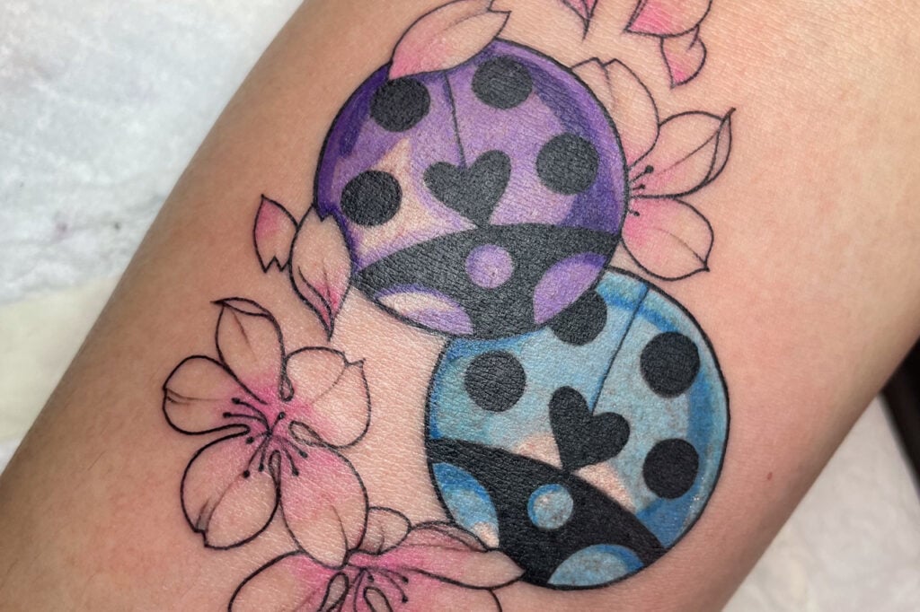 JoJo Part 5 ladybug brooch emblem tattoo, small and stylish.