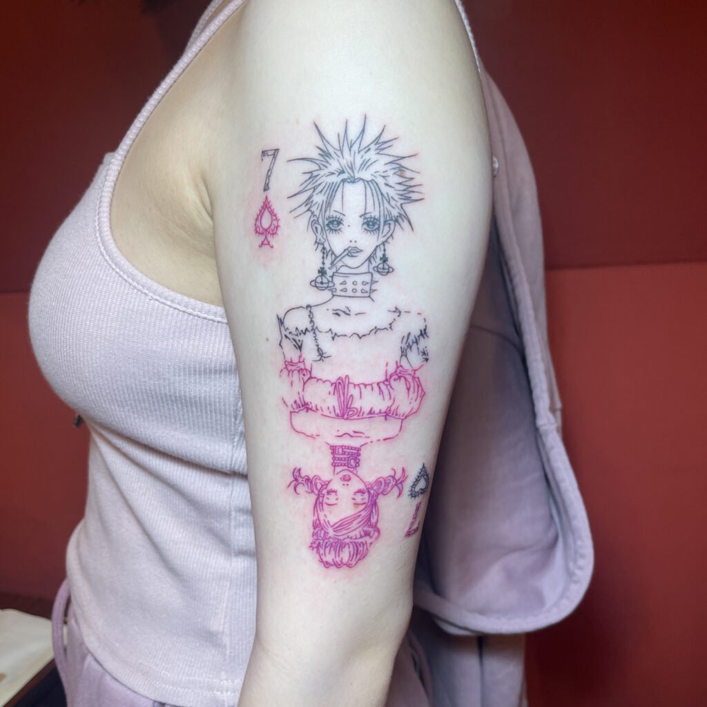 minimalist emblem/text tattoo referencing the music drama.