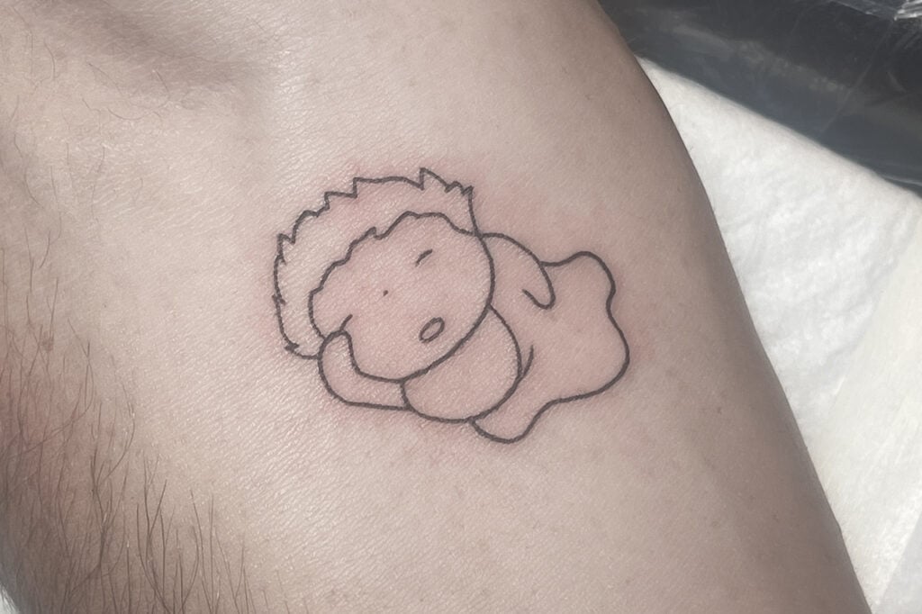 Simple Ponyo motif tattoo with clear round shapes, Osaka studio.
