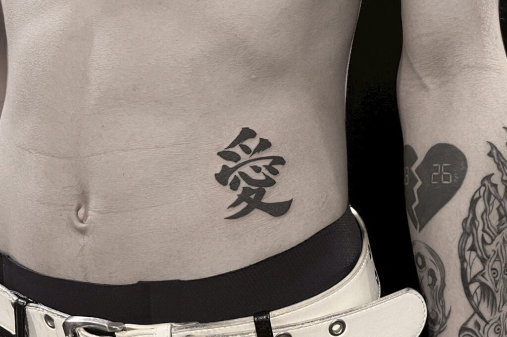 Kanji Tattoo "Kaizen" (Self‑Improvement) by Good Times Ink, Osaka.