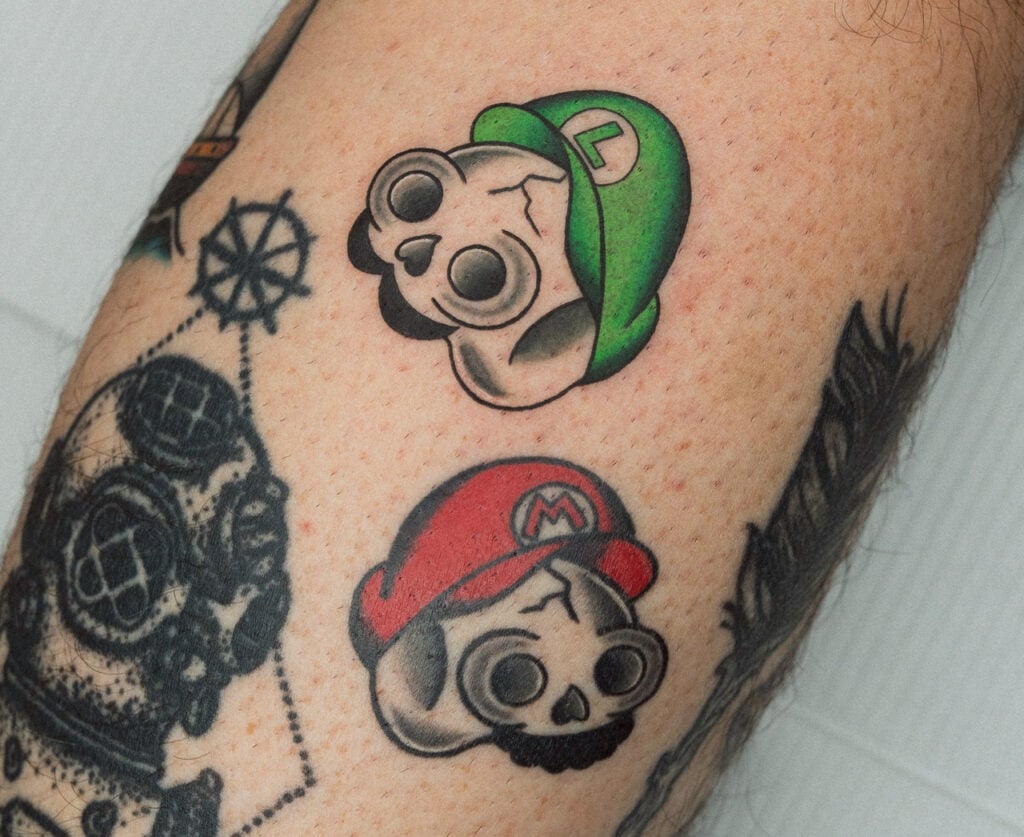 Skull-style Mario and Luigi tattoo reinterpreted by Horihiyu, created at Good Times Ink Osaka.